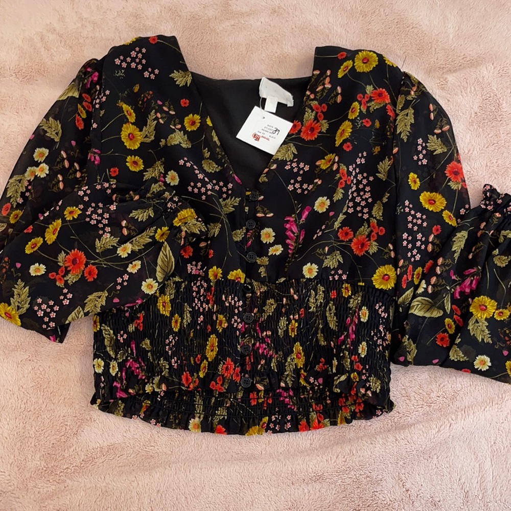 black blouse with floral pattern